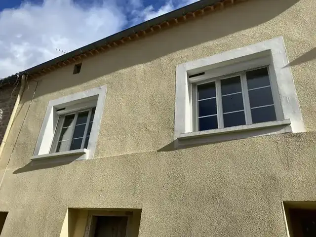 Rénovation en PVC à petits bois et volet roulant solaire Somfy