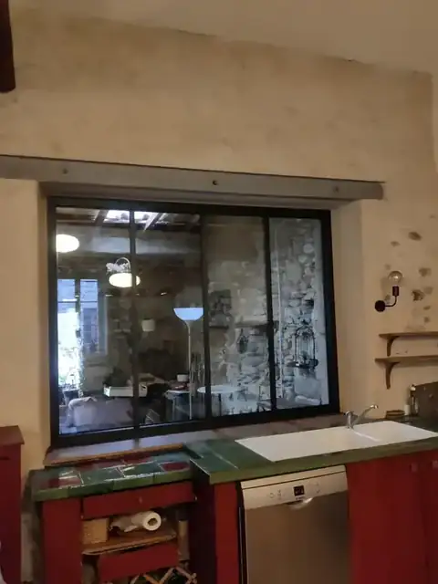 Une verrière atelier en double vitrage